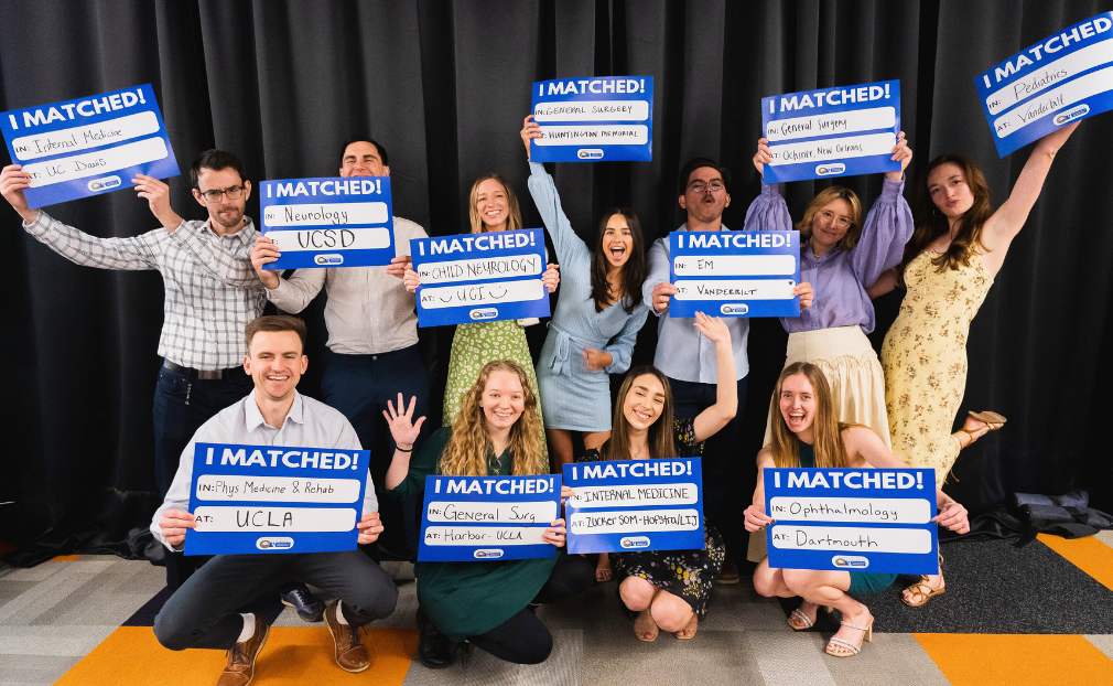 Medical students celebrating Match Day with I MATCHED signs